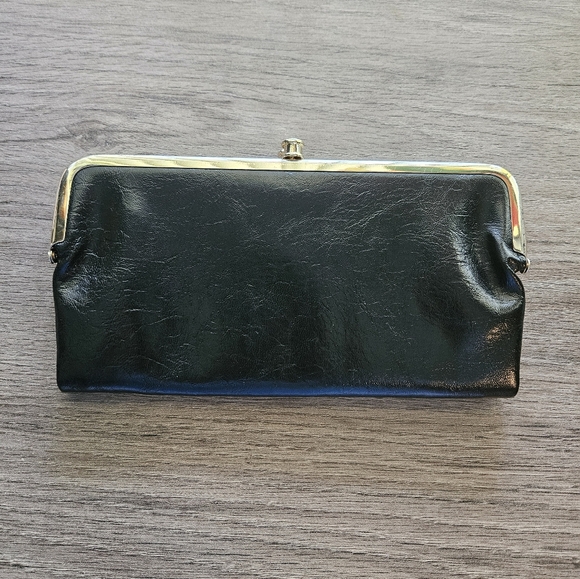 Handbags - Elegant Black Leather Clutch